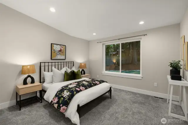 Secondary bedroom on the main floor with an ensuite.