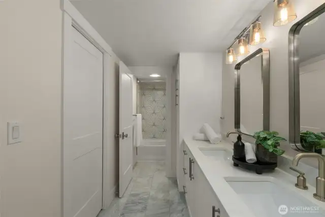 Double sink vanity full bath.