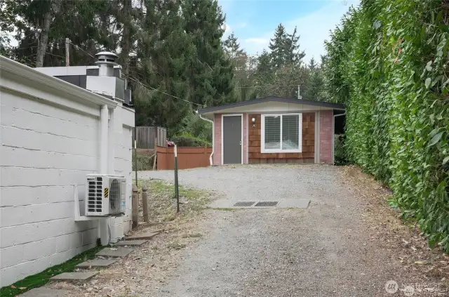 Picture showing driveway to rear building
