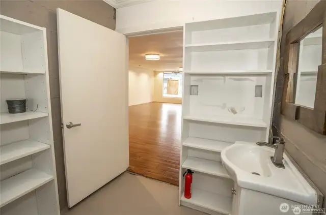 bathroom in front building looking out