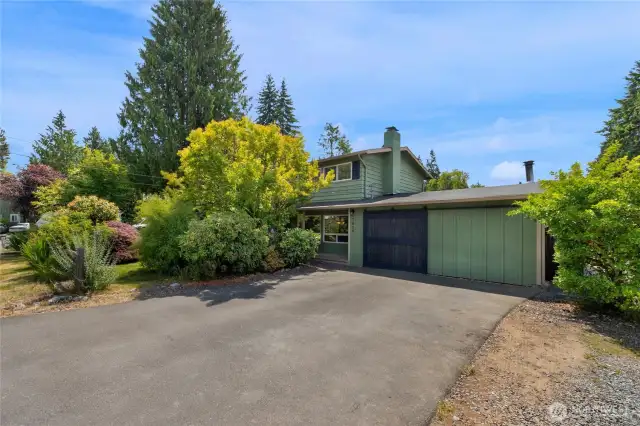 Good sized driveway with sliding garage door