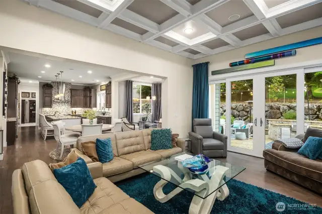 Glass doors from the great room lead to the stunning back yard.
