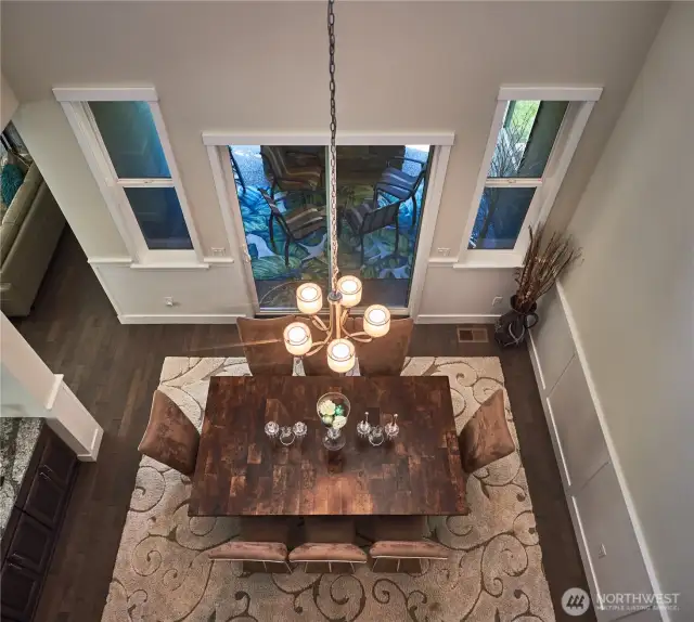The dining room opens to a private covered patio with its own gas fireplace - a 4-season outdoor space!