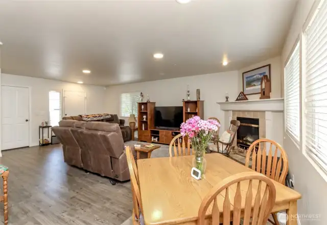 Gas fireplace in the background.
