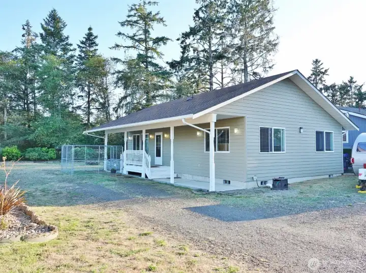 Enjoy living at the Beach in this comfortable home on an extra-large lot.