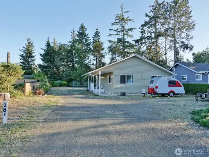 Front of the Home with a huge driveway.