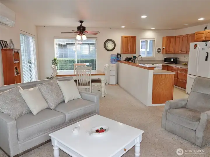 The Living Room opens into the Dining Area and Kitchen.