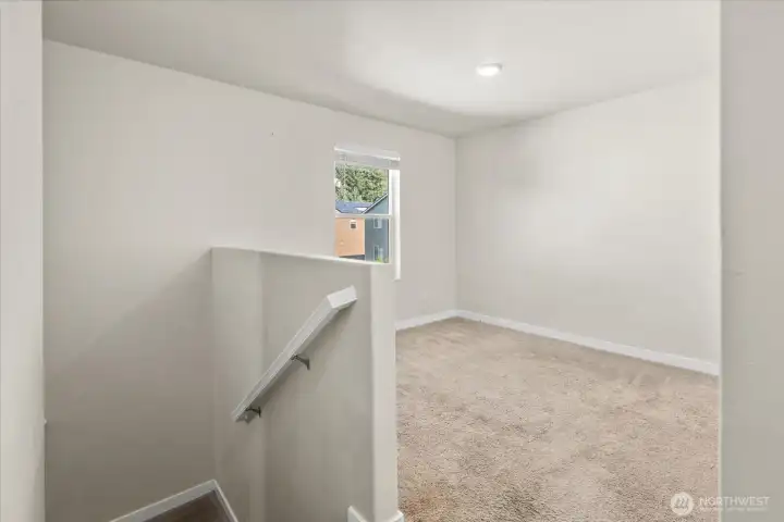 Upstairs, you'll find a bonus room. This flex space is perfect for an office, play room, or bonus living space.
