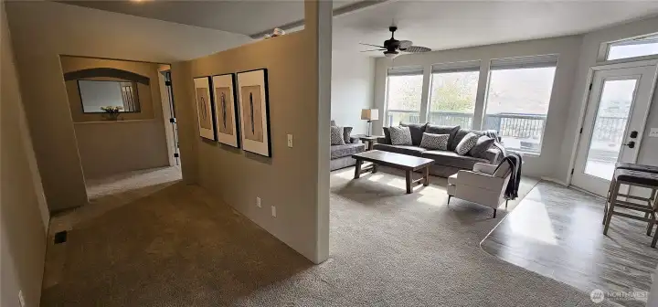 The Gallery Hallway leading to the bedroom wing is unusually wide, offering ample space for a full-length art gallery or console tables...