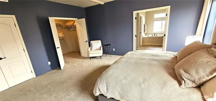 Double door entries to room, walk-in closet and bath