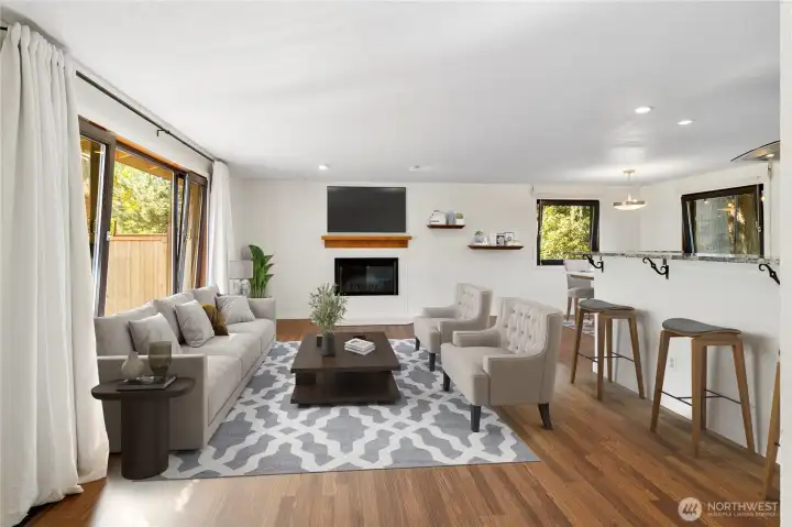 The large living room is open to the dining room and kitchen!