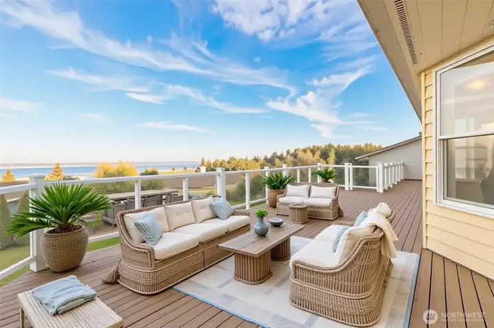 Large deck off the Living room / Great room. You can enjoy the vast open skies and see the Northern Lights, stargazing, sunrises and the sky glow sunsets. *Virtually staged*