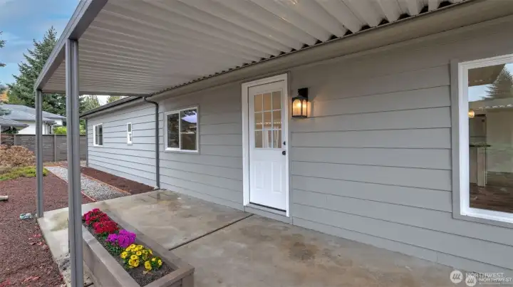 Covered patio new front door and raised Flower Box