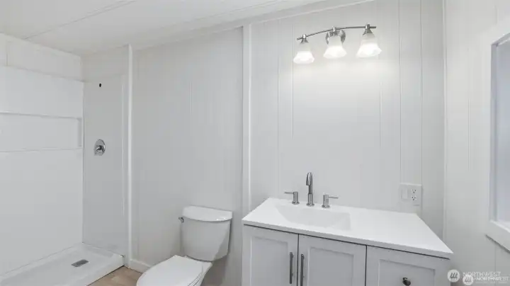 Master Bath with walk in double shower and new vanity