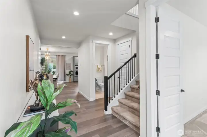 Entryway with both a mainfloor bedroom and bathroom.