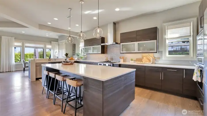 o Massive quartz island kitchen centerpiece  o Custom lighting with under-cabinet kitchen lighting