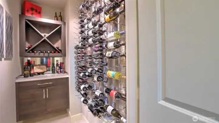 o 170+ Bottle capacity  o Floating cabinets/counter  o Naturally climate-controlled basement location  o Inconspicuous and tastefully designed to match the home interior