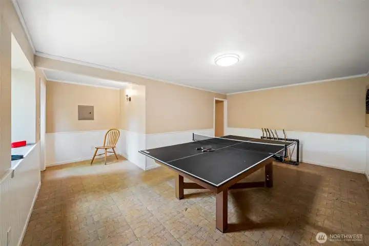 Downstairs bonus room with door leading outside