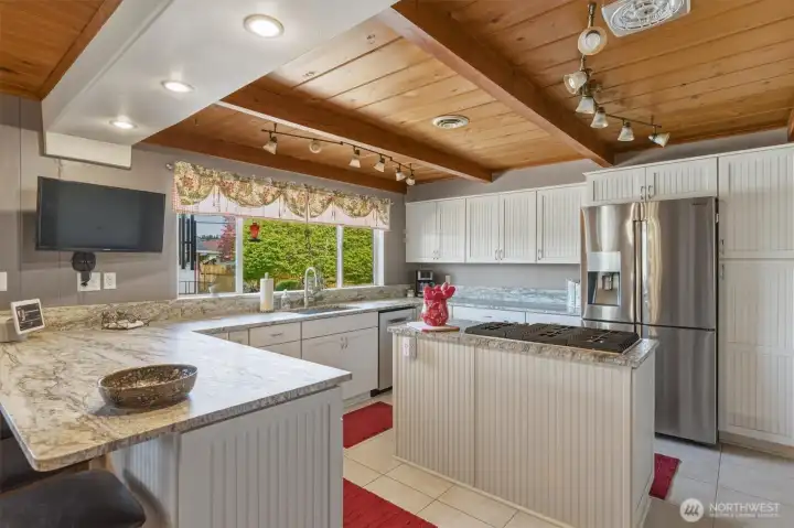 Kitchen with Tongue and Groove and Open Beam Ceilings.