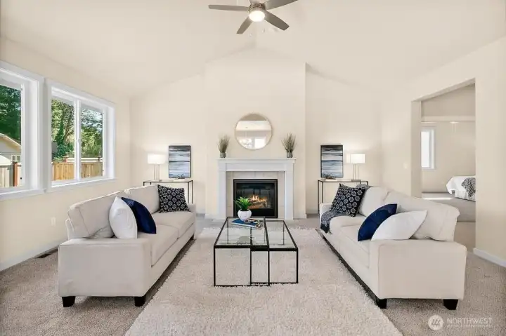 Grand living room with a gas fireplace.