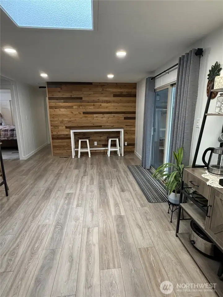 Long shot of family room from kitchen