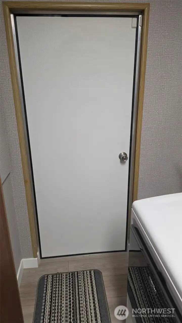 New steel door in laundry room