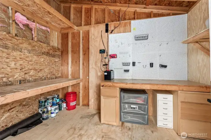 Work shop right off the patio across from the front door.