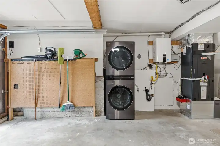 Big 2-Car Garage with Plenty of Room for Storage and Additional Stacked Washer and Gas Dryer included. You'll Benefit from the Newer Gas Furnace, Newer Gas Tankless Hot Water Heater, and Newer AC Unit.