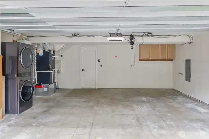 Big 2-Car Garage with Plenty of Room for Storage and Additional Stacked Washer and Gas Dryer included. You'll Benefit from the Newer Gas Furnace, Newer Gas Tankless Hot Water Heater, and Newer AC Unit.