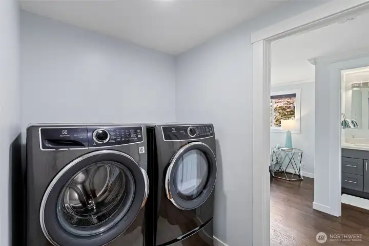 In-wing laundry. Barely used Electrolux front-loads included.