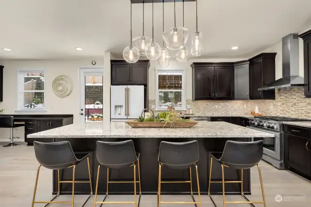 Gorgeous Chef's kitchen and oversized island with seating