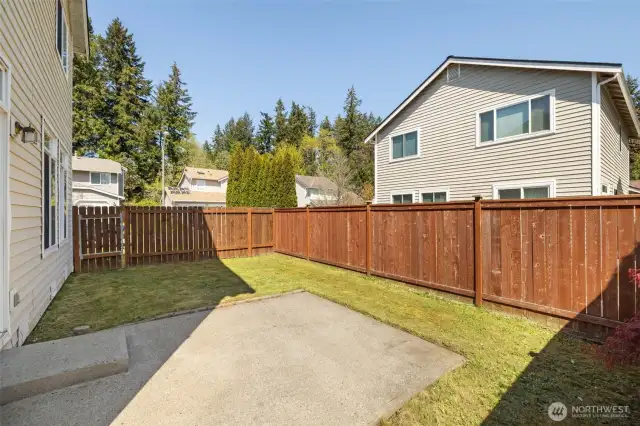 Private fenced back yard and patio