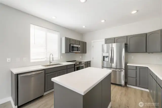 Updated kitchen with solid core counter tops