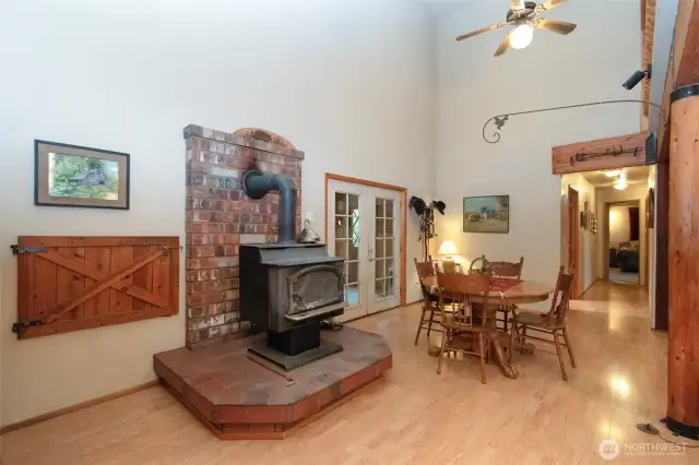 Wood stove and dining area of great room.