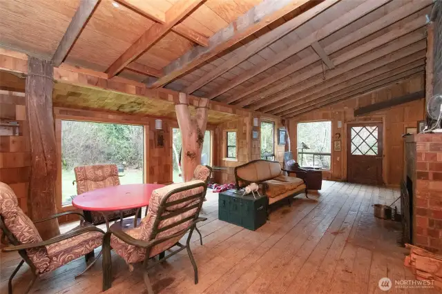 Another view of enclosed back porch which is as large as many living rooms.