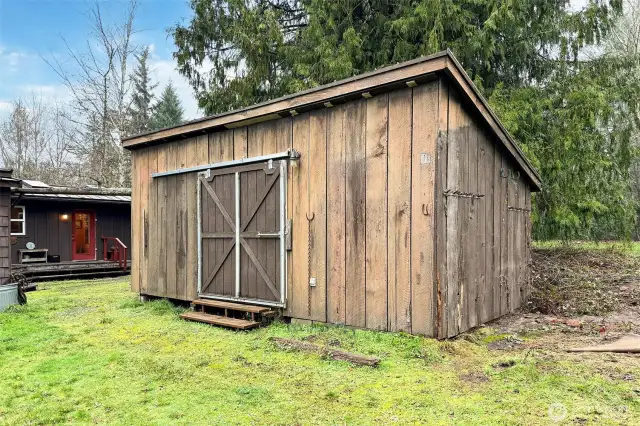 Small work shop at rear of house.