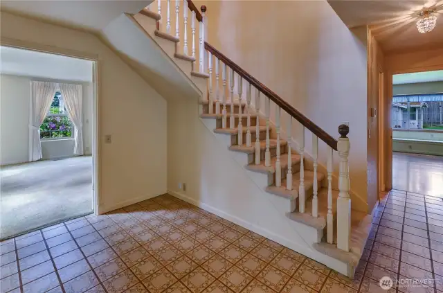 Entry looking towards living room and hall to back of house.