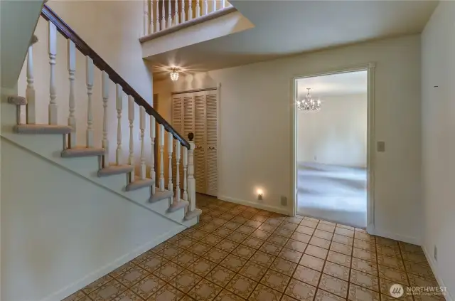 Entry looking towards dining room and hall to back of house.