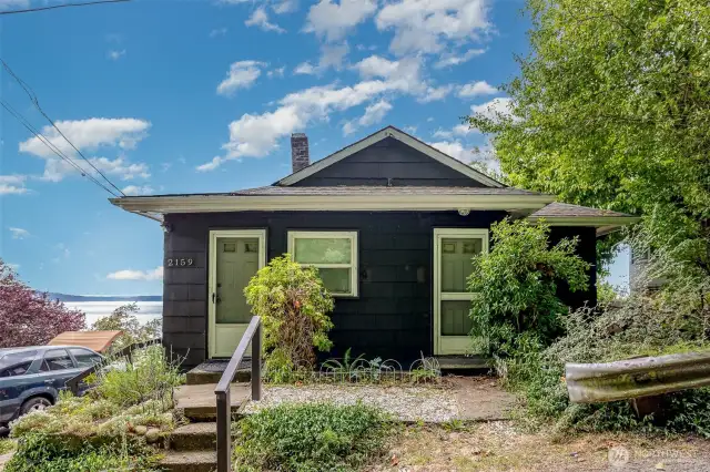 Don’t miss this charming Alki Beach home with sweeping views!