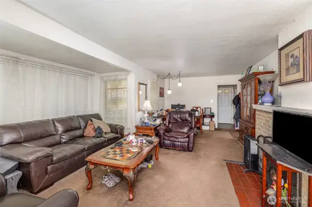 Another view of the living space highlighting the charming cut outs.
