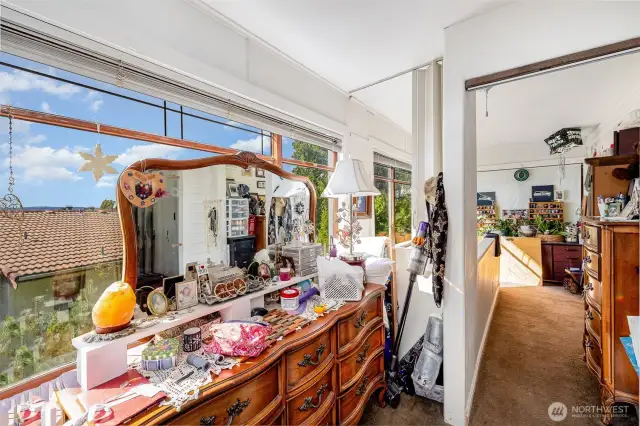 Windows flood the space with natural light and showcase stunning outdoor views.