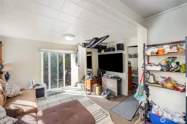 Endless possibilities for this versatile space—perfect as a spacious office, playroom, or second living area.