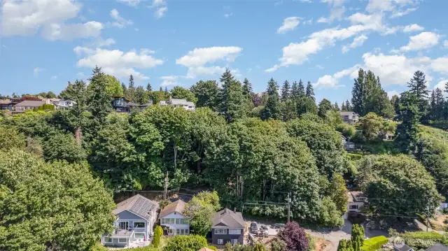 Nestled on the hill, this home offers elevated views and a sense of peaceful seclusion.
