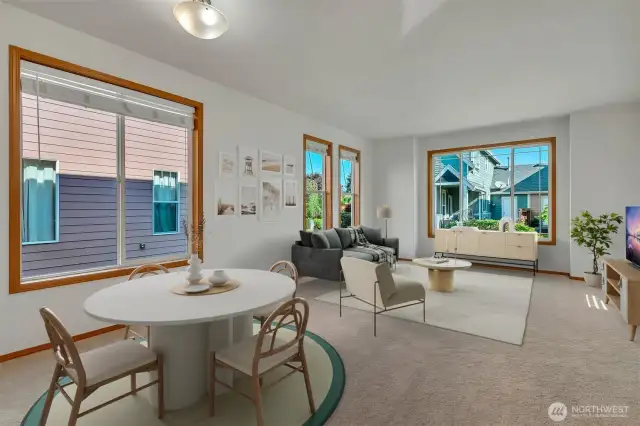 Virtually staged dining and living area.