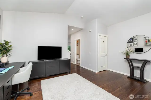 Half bath conveniently located between formal living room and the family room/great room- door to bath seen here on right hand wall.