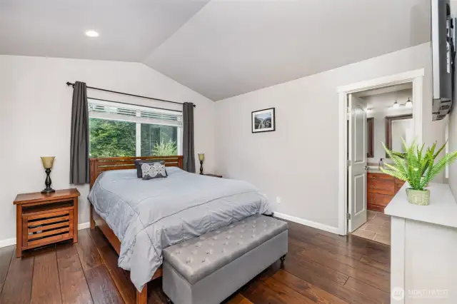 Well appointed master suite includes a large bedroom and attached bath with walk-in closet.