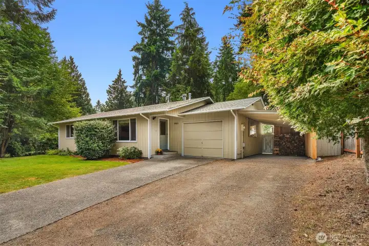 Perfectly centered on the 1/4 acre lot, behind a stunning row of evergreens, located in a friendly neighborhood just 5 minutes from Vashon town core - where you will find everything you need to enjoy island life. Added bonus is the 2 covered parking spaces with even more room to park in the driveway.
