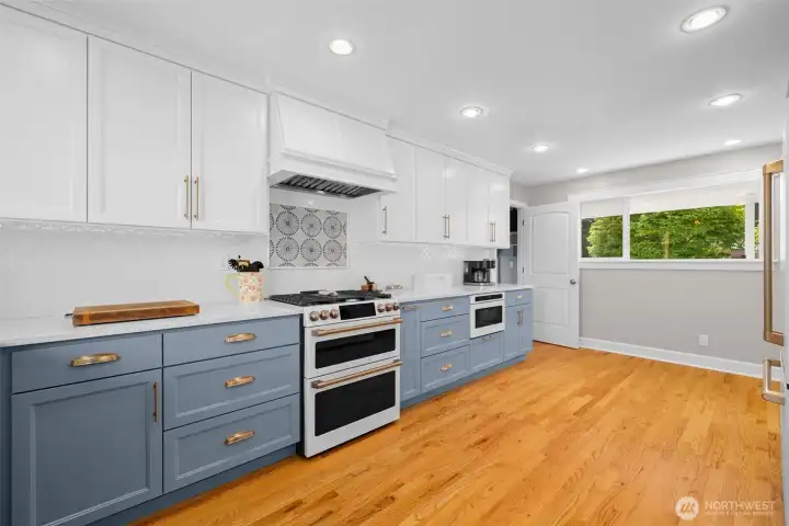 Sleek cabinetry, modern appliances, and abundant counter space