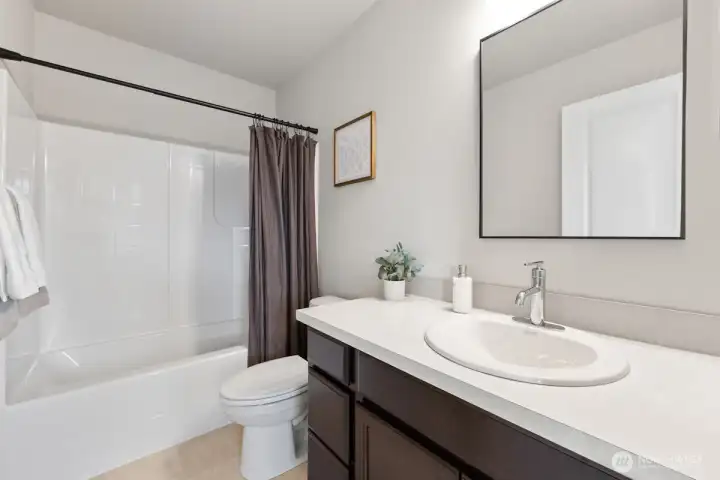 Photographs are for illustrative purposes only. Features, finishes, interior/exterior colors, landscaping and floorplan shown may vary from actual homes built.