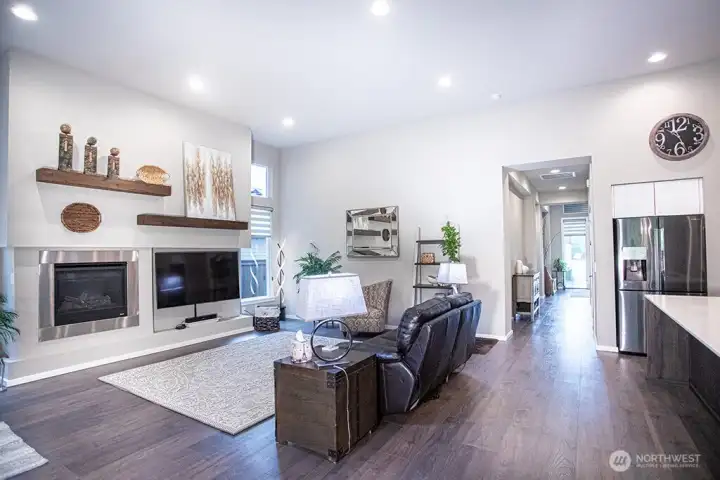 Living room with hallway to entry beyond